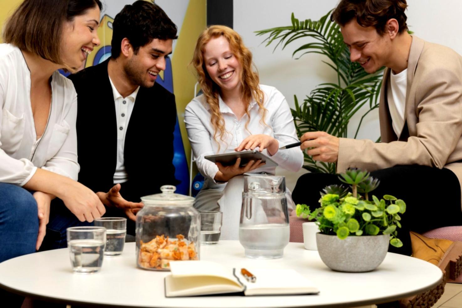 Marketing agency team reviewing financial documents